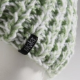 Шапка жен Nikita Mellow White/Paradise Green 2010 г инфо 6627r.